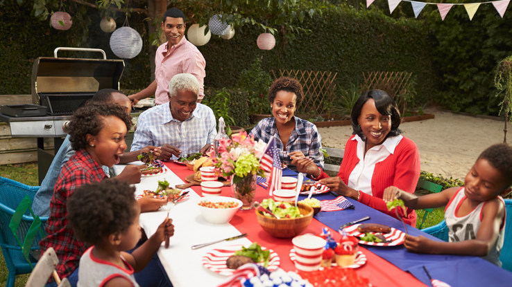 multi generation black family at table for 4th jul 2021 08 26 16 13 15 utc